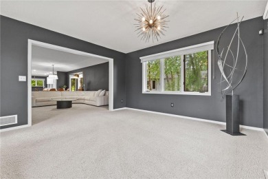 Over 3,100 sq ft of beautifully maintained living space on the on Majestic Oaks Golf Club  in Minnesota - for sale on GolfHomes.com, golf home, golf lot