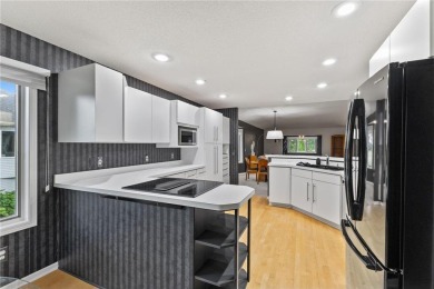 Over 3,100 sq ft of beautifully maintained living space on the on Majestic Oaks Golf Club  in Minnesota - for sale on GolfHomes.com, golf home, golf lot