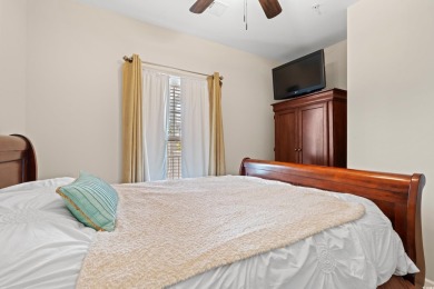 This charming 2-bedroom, 2-bathroom second-floor end unit is on Barefoot Resort and Golf Club  in South Carolina - for sale on GolfHomes.com, golf home, golf lot