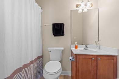 This charming 2-bedroom, 2-bathroom second-floor end unit is on Barefoot Resort and Golf Club  in South Carolina - for sale on GolfHomes.com, golf home, golf lot