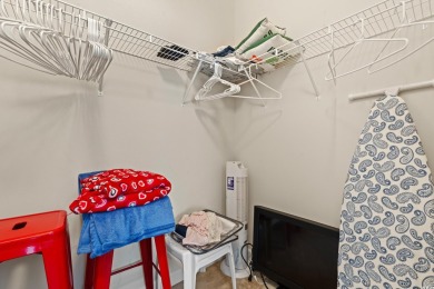 This charming 2-bedroom, 2-bathroom second-floor end unit is on Barefoot Resort and Golf Club  in South Carolina - for sale on GolfHomes.com, golf home, golf lot