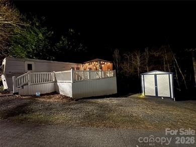 Welcome to lake living made easy in the highly sought-after on Old North State Club at Uwharrie Point Golf community in North Carolina - for sale on GolfHomes.com, golf home, golf lot