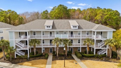This charming 2-bedroom, 2-bathroom second-floor end unit is on Barefoot Resort and Golf Club  in South Carolina - for sale on GolfHomes.com, golf home, golf lot