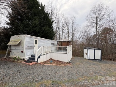 Welcome to lake living made easy in the highly sought-after on Old North State Club at Uwharrie Point Golf community in North Carolina - for sale on GolfHomes.com, golf home, golf lot