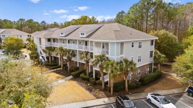 This charming 2-bedroom, 2-bathroom second-floor end unit is on Barefoot Resort and Golf Club  in South Carolina - for sale on GolfHomes.com, golf home, golf lot