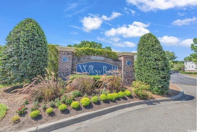 This charming 2-bedroom, 2-bathroom second-floor end unit is on Barefoot Resort and Golf Club  in South Carolina - for sale on GolfHomes.com, golf home, golf lot