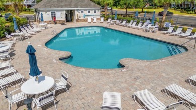 This charming 2-bedroom, 2-bathroom second-floor end unit is on Barefoot Resort and Golf Club  in South Carolina - for sale on GolfHomes.com, golf home, golf lot