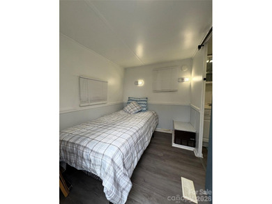 Welcome to lake living made easy in the highly sought-after on Old North State Club at Uwharrie Point Golf community in North Carolina - for sale on GolfHomes.com, golf home, golf lot