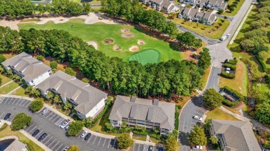 This charming 2-bedroom, 2-bathroom second-floor end unit is on Barefoot Resort and Golf Club  in South Carolina - for sale on GolfHomes.com, golf home, golf lot