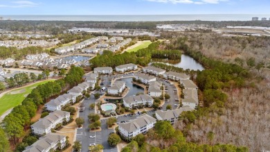 This charming 2-bedroom, 2-bathroom second-floor end unit is on Barefoot Resort and Golf Club  in South Carolina - for sale on GolfHomes.com, golf home, golf lot