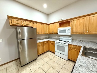 This spacious half-duplex in Golf View Villas features both on Teetering Rocks Links in Missouri - for sale on GolfHomes.com, golf home, golf lot