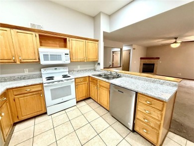 This spacious half-duplex in Golf View Villas features both on Teetering Rocks Links in Missouri - for sale on GolfHomes.com, golf home, golf lot