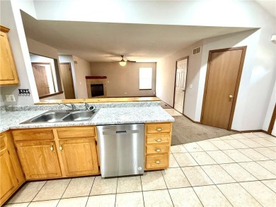 This spacious half-duplex in Golf View Villas features both on Teetering Rocks Links in Missouri - for sale on GolfHomes.com, golf home, golf lot