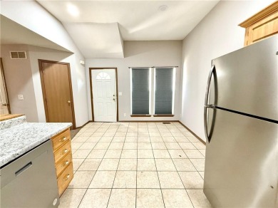 This spacious half-duplex in Golf View Villas features both on Teetering Rocks Links in Missouri - for sale on GolfHomes.com, golf home, golf lot