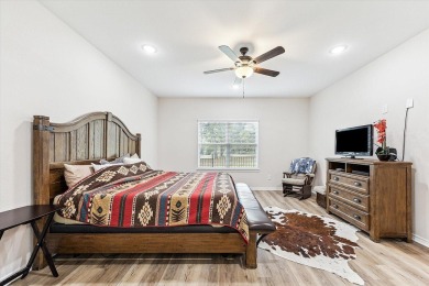 Exceptional 3-bed, 2.5-bath custom home on 2 lots in the gated on The Falls Resort and Club in Texas - for sale on GolfHomes.com, golf home, golf lot
