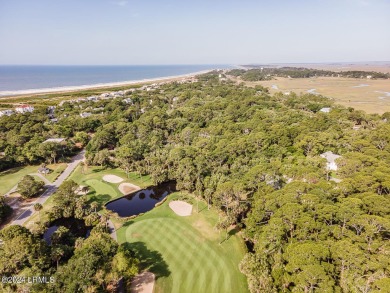 BEAUTIFUL, LUSH,  .56-ACRE LOT looking out over lagoon onto 5th on Ocean Point Golf Links in South Carolina - for sale on GolfHomes.com, golf home, golf lot