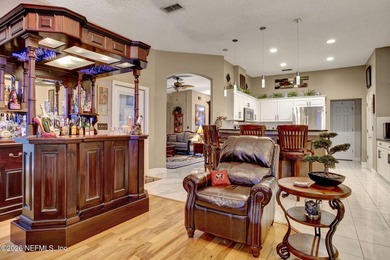 Private pool home in gated Orange Park Country Club backing to on Country Club of Orange Park in Florida - for sale on GolfHomes.com, golf home, golf lot