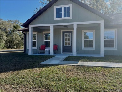 New home on corner lot. 2025 build. Has a wooded border in the on Citrus Springs Country Club in Florida - for sale on GolfHomes.com, golf home, golf lot