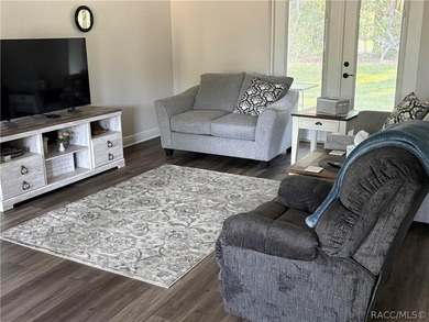 New home on corner lot. 2025 build. Has a wooded border in the on Citrus Springs Country Club in Florida - for sale on GolfHomes.com, golf home, golf lot