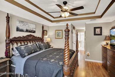 Private pool home in gated Orange Park Country Club backing to on Country Club of Orange Park in Florida - for sale on GolfHomes.com, golf home, golf lot