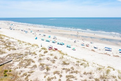 BEAUTIFUL, LUSH,  .56-ACRE LOT looking out over lagoon onto 5th on Ocean Point Golf Links in South Carolina - for sale on GolfHomes.com, golf home, golf lot