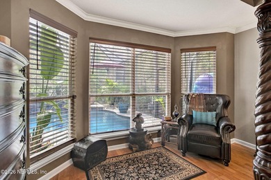 Private pool home in gated Orange Park Country Club backing to on Country Club of Orange Park in Florida - for sale on GolfHomes.com, golf home, golf lot