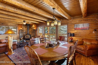 This stunning custom log home on Hole #1 of Aspen Hills Golf on Star Valley RV Golf Course in Wyoming - for sale on GolfHomes.com, golf home, golf lot