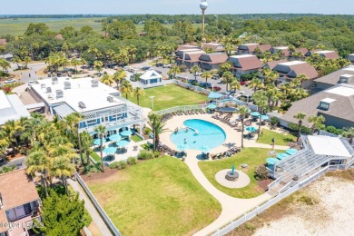 BEAUTIFUL, LUSH,  .56-ACRE LOT looking out over lagoon onto 5th on Ocean Point Golf Links in South Carolina - for sale on GolfHomes.com, golf home, golf lot