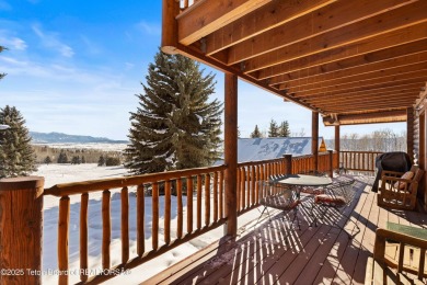 This stunning custom log home on Hole #1 of Aspen Hills Golf on Star Valley RV Golf Course in Wyoming - for sale on GolfHomes.com, golf home, golf lot