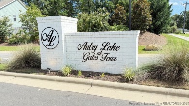 Autry Lake at Gates Four Gated Community, 4 bedroom 2.5 bath on Gates Four Golf and Country Club in North Carolina - for sale on GolfHomes.com, golf home, golf lot