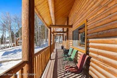 This stunning custom log home on Hole #1 of Aspen Hills Golf on Star Valley RV Golf Course in Wyoming - for sale on GolfHomes.com, golf home, golf lot