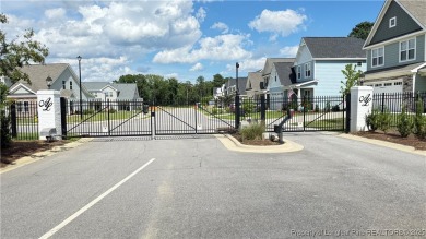 Autry Lake at Gates Four Gated Community, 4 bedroom 2.5 bath on Gates Four Golf and Country Club in North Carolina - for sale on GolfHomes.com, golf home, golf lot