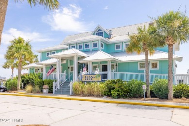 BEAUTIFUL, LUSH,  .56-ACRE LOT looking out over lagoon onto 5th on Ocean Point Golf Links in South Carolina - for sale on GolfHomes.com, golf home, golf lot