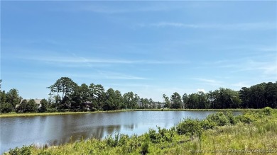 Autry Lake at Gates Four Gated Community, 4 bedroom 2.5 bath on Gates Four Golf and Country Club in North Carolina - for sale on GolfHomes.com, golf home, golf lot