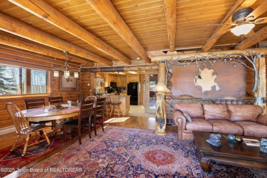 This stunning custom log home on Hole #1 of Aspen Hills Golf on Star Valley RV Golf Course in Wyoming - for sale on GolfHomes.com, golf home, golf lot