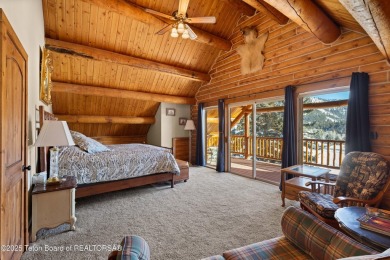 This stunning custom log home on Hole #1 of Aspen Hills Golf on Star Valley RV Golf Course in Wyoming - for sale on GolfHomes.com, golf home, golf lot