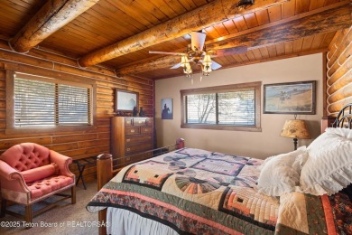 This stunning custom log home on Hole #1 of Aspen Hills Golf on Star Valley RV Golf Course in Wyoming - for sale on GolfHomes.com, golf home, golf lot