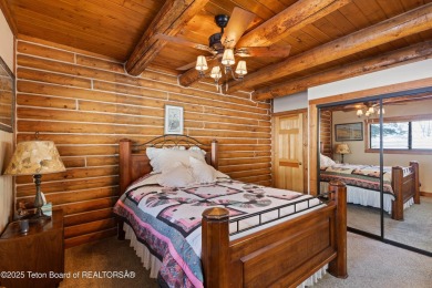 This stunning custom log home on Hole #1 of Aspen Hills Golf on Star Valley RV Golf Course in Wyoming - for sale on GolfHomes.com, golf home, golf lot