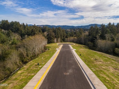 An excellent opportunity to purchase a lot with forested views on Chinook Winds Golf Resort in Oregon - for sale on GolfHomes.com, golf home, golf lot