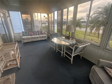 Enjoy a home and your own golf cart in the active 55+ community on Riverwood Golf Club in Florida - for sale on GolfHomes.com, golf home, golf lot