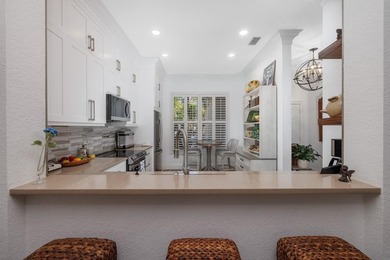 This is a TOTALLY UPDATED absolutely lovely VILLA in Monarch on  in Florida - for sale on GolfHomes.com, golf home, golf lot