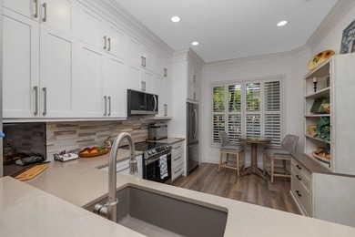 This is a TOTALLY UPDATED absolutely lovely VILLA in Monarch on  in Florida - for sale on GolfHomes.com, golf home, golf lot