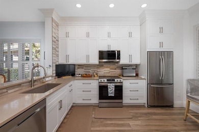 This is a TOTALLY UPDATED absolutely lovely VILLA in Monarch on  in Florida - for sale on GolfHomes.com, golf home, golf lot