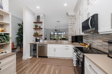 This is a TOTALLY UPDATED absolutely lovely VILLA in Monarch on  in Florida - for sale on GolfHomes.com, golf home, golf lot