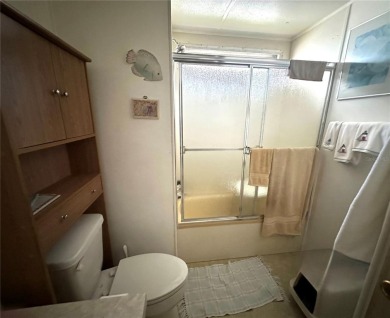 Enjoy a home and your own golf cart in the active 55+ community on Riverwood Golf Club in Florida - for sale on GolfHomes.com, golf home, golf lot
