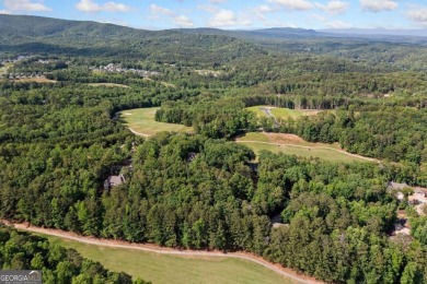 This gently sloped lot backs directly up to the lush fairways of on The Highlands Course at Lake Arrowhead in Georgia - for sale on GolfHomes.com, golf home, golf lot