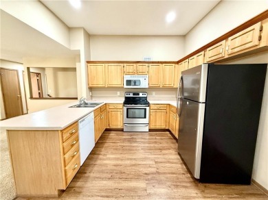This spacious half-duplex in Golf View Villas features both on Teetering Rocks Links in Missouri - for sale on GolfHomes.com, golf home, golf lot