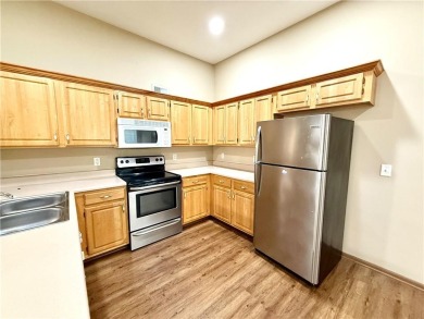 This spacious half-duplex in Golf View Villas features both on Teetering Rocks Links in Missouri - for sale on GolfHomes.com, golf home, golf lot
