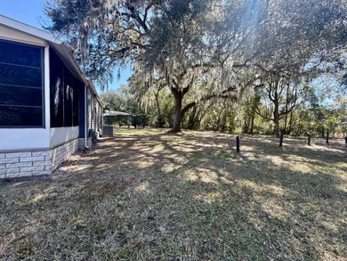 Home is located in Water Oak Country Club Estates, an active 55 on Water Oak Country Club Estates in Florida - for sale on GolfHomes.com, golf home, golf lot