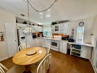 Home is located in Water Oak Country Club Estates, an active 55 on Water Oak Country Club Estates in Florida - for sale on GolfHomes.com, golf home, golf lot